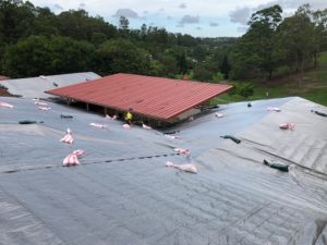 Roof Tarping Construction Storm Damage